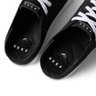 Close-up top view of the black Neptune HT shoes facing upward, showcasing REEF comfort and arch support.