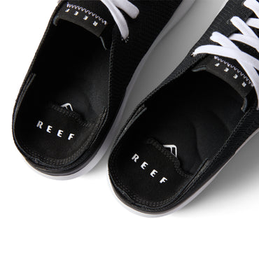 Close-up top view of the black Neptune HT shoes facing upward, showcasing REEF comfort and arch support.