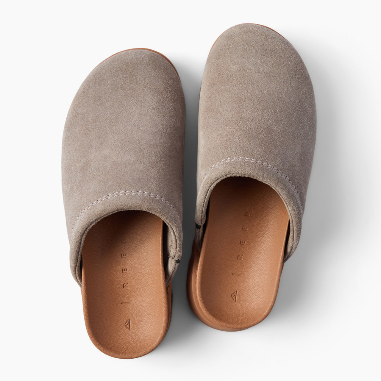 Vista Luxe Mariana suede clogs viewed from above with toes facing upward and heels toward the viewer