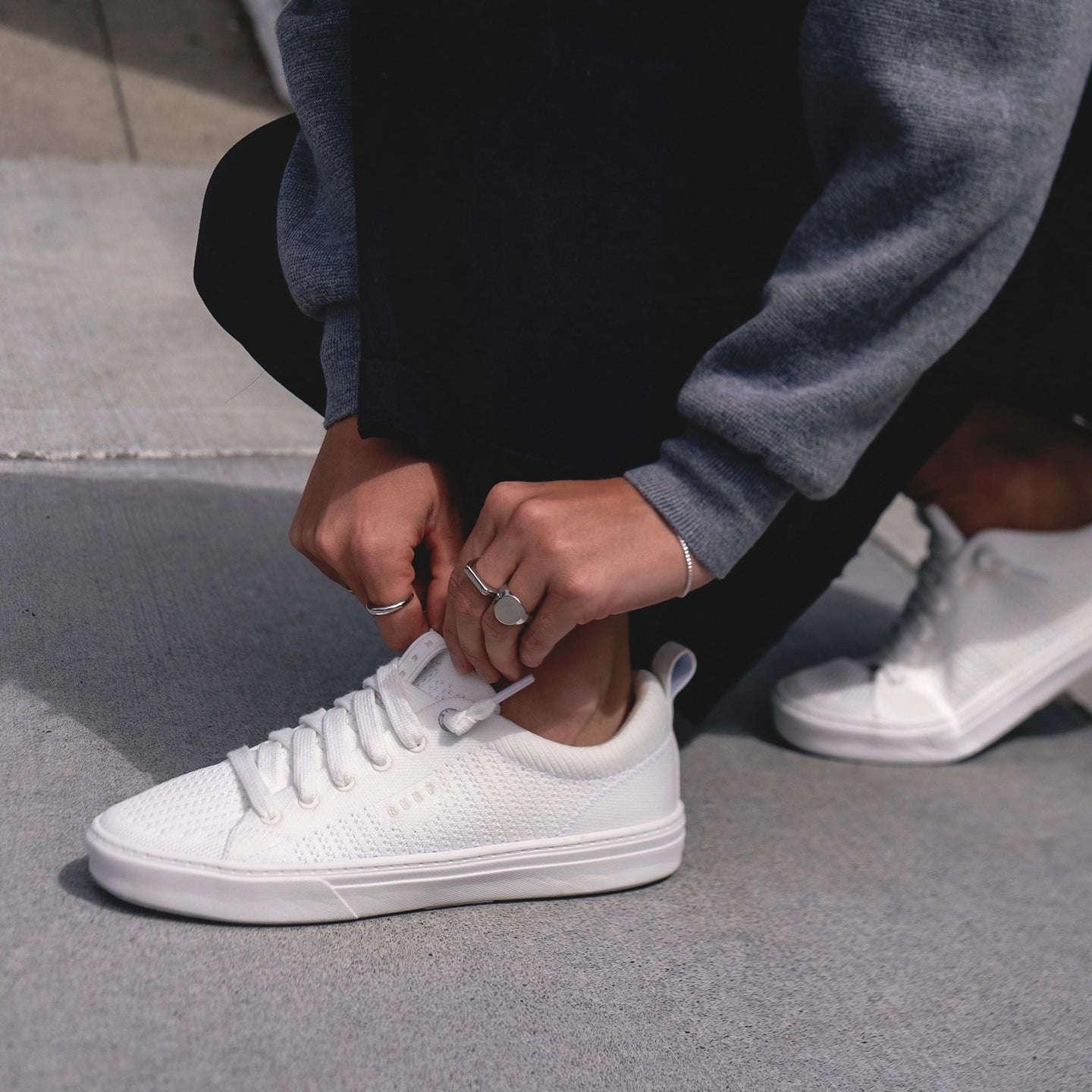 Close-up of the left Lay Day Lite sneaker facing left, highlighting lightweight, beach-inspired comfort and support.