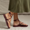 Willow Quinn sandal facing left with sleek burgundy vegan straps, cushioned sole, and anatomical arch support for all-day comfort