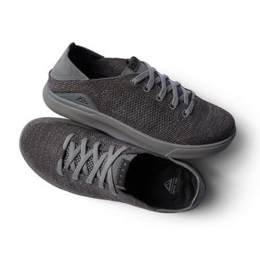 Neptune HT men's black sneaker pair with lightweight breathable knit upper, REEFlex cushioning, and anatomical arch support.