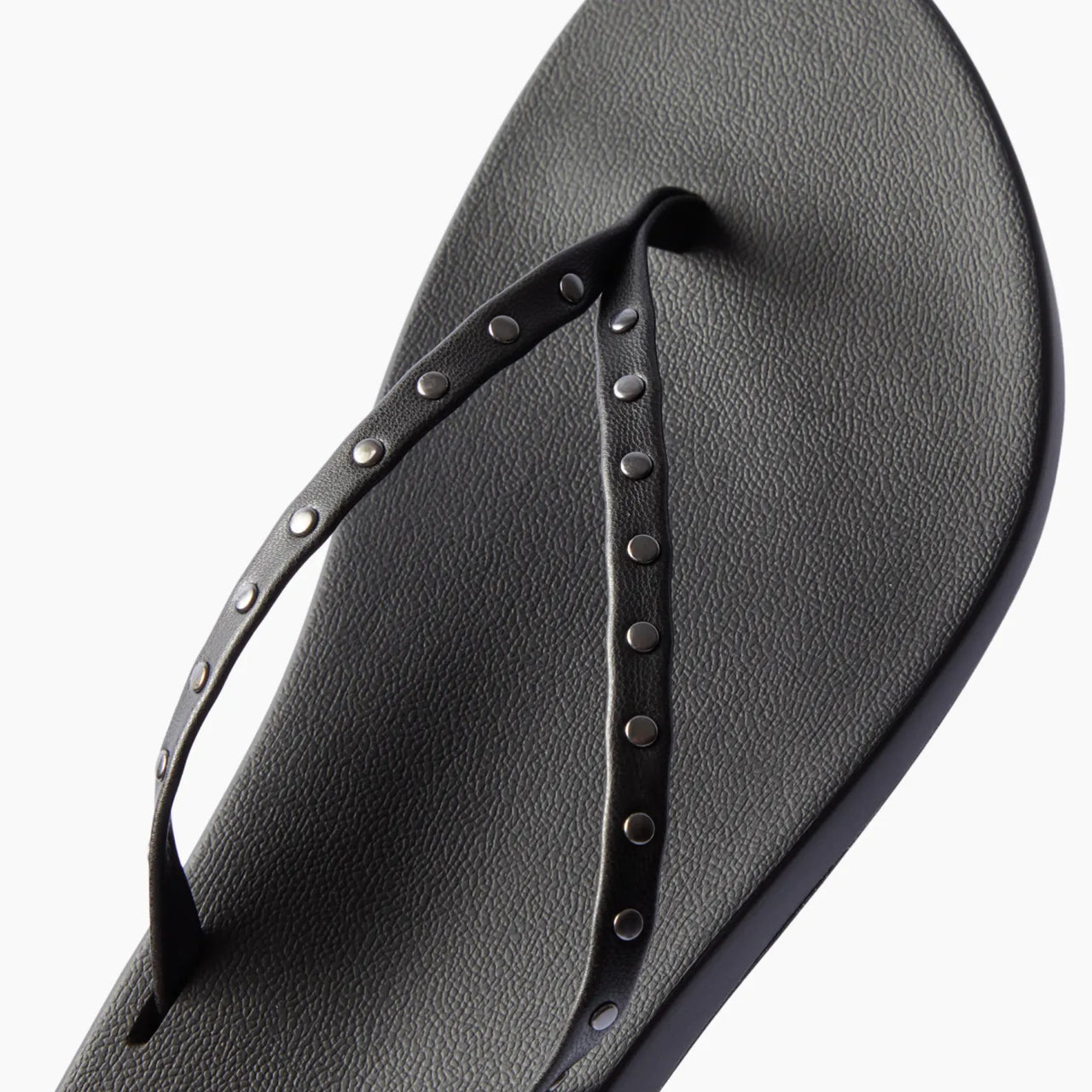 Top view of black Cushion Slim Studs sandal for women with studded straps and comfort cushioning for beachwear.
