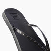 Cushion Slim Studs black women's sandal facing left, close-up of straps with slim studs, comfort-focused beach footwear.