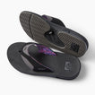 Fanning REEF black flip flops, one facing left with outsole visible and one facing right with footbed visible