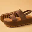 Close-up of the right-facing "Water Vista Higher" sandal in espresso brown, featuring textured straps and cushioned platform sole.