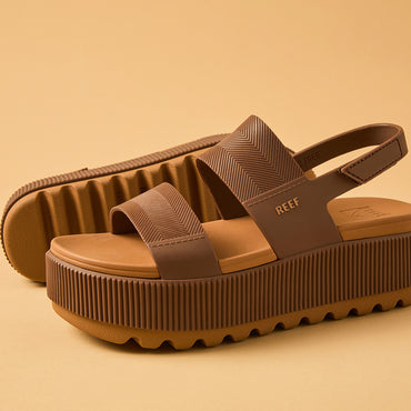 Close-up of the right-facing "Water Vista Higher" sandal in espresso brown, featuring textured straps and cushioned platform sole.