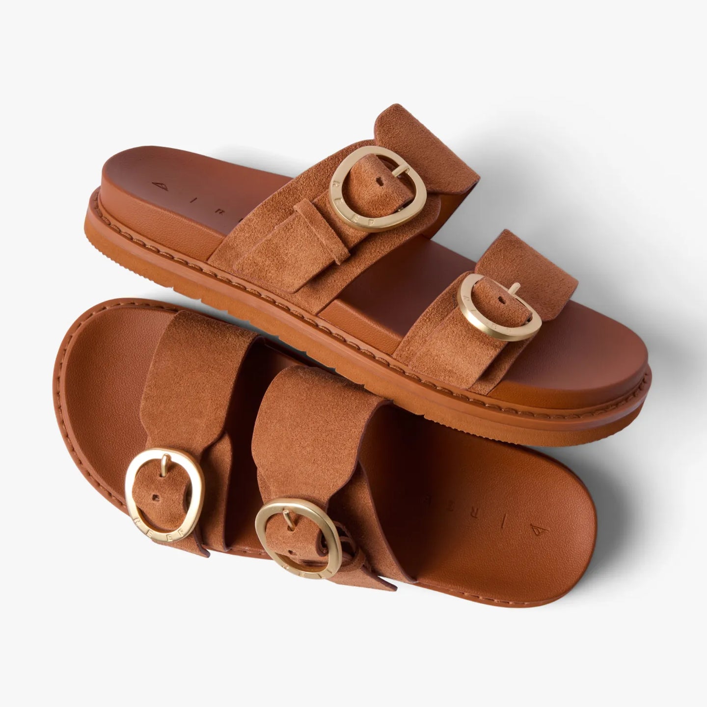 Top and side view of Vista Daphne cognac suede slide sandal with adjustable buckles, highlighting arch support and comfort features.