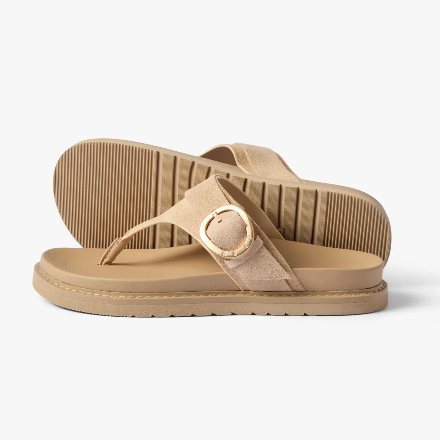 Pair of left-facing Vista Gabriella sandals in warm sand suede with buckle detail, featuring comfort cushioning and arch support.