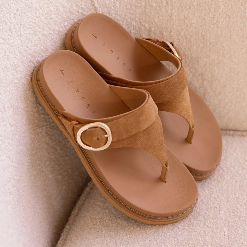 Vista Gabriella suede sandals facing up with buckle detail, arch support, and soft cushioning for beach comfort.