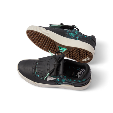 Top and side view of black Onshore Pebble X Palm men's sneaker with teal palm pattern, facing left, showing sole and upper design
