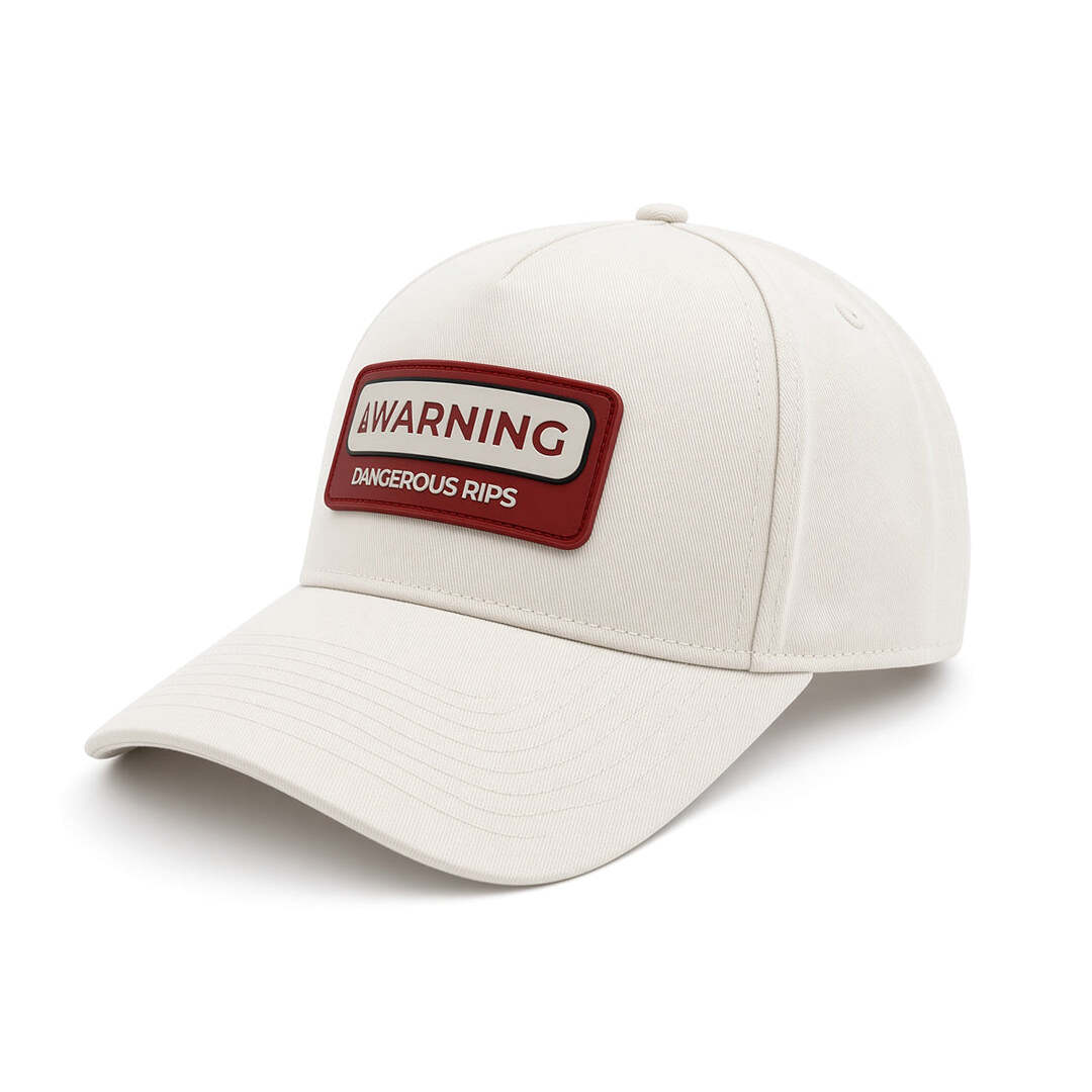 REEF x Palm Dangerous Rips Snapback white hat shown facing left with Dangerous Rips front patch