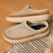 Pair of Rambler Mule Brown placed on a carpet with a top and side view