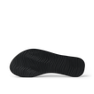 Bottom sole of Cushion Slim black women's footwear showing textured water-friendly rubber grip for beach comfort and durability