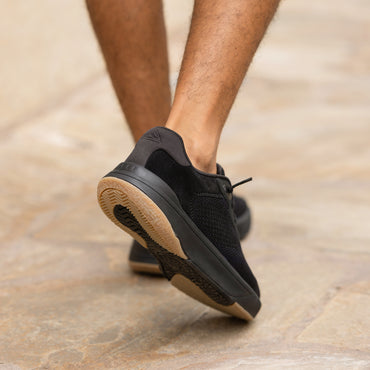 Rear view of Shoreline Del Mar men's shoe in black with gum sole, showing lightweight, cushioned design for beach comfort.