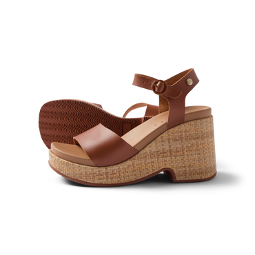 Sunset Sayulita women's brown leather sandals facing left, showing side and sole with anatomical arch support and cushioned footbed.