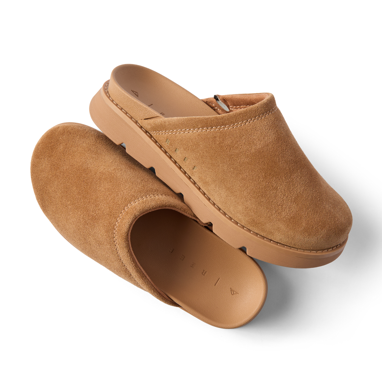 Vista Luxe Mariana suede clogs, one facing right and one facing lower left, with cushioned footbeds and arch support