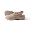 Side view of beige Vista Skye Rosa clog with adjustable backstrap, showcasing durable sole and comfort design features.