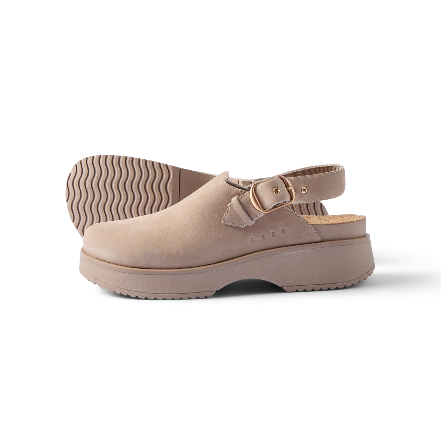 Side view of beige Vista Skye Rosa clog with adjustable backstrap, showcasing durable sole and comfort design features.