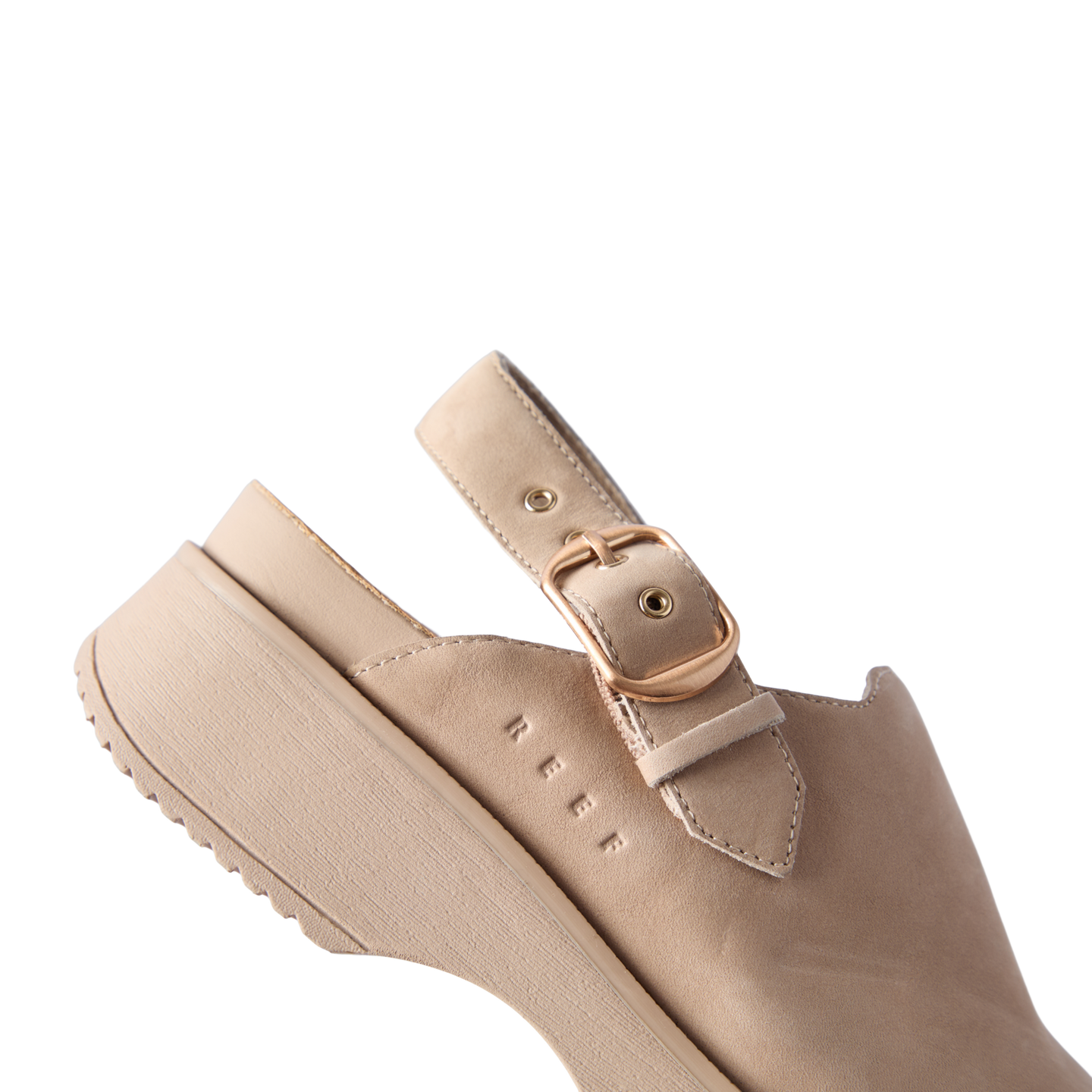 Vista Skye Rosa beige clog facing left with adjustable backstrap, cushioned sole, and reef branding on the side