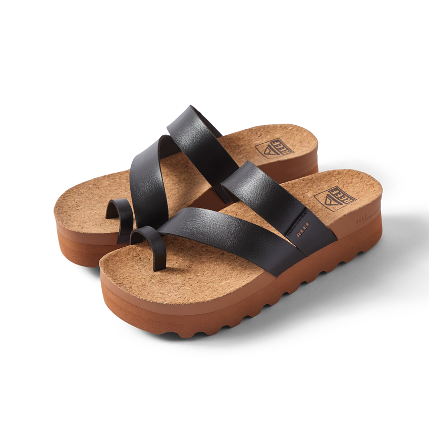 Vista Hi Layla women's sandals facing left, black straps with toe loop, cushioned cork footbed, platform sole, beach-inspired comfort.