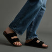 Ojai Two Bar sandals facing right, close-up on upper foot and straps, showing comfort-focused, beach-inspired design.