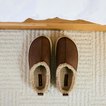 Weekend Low Brooke brown leather mules facing upward with cozy shearling lining