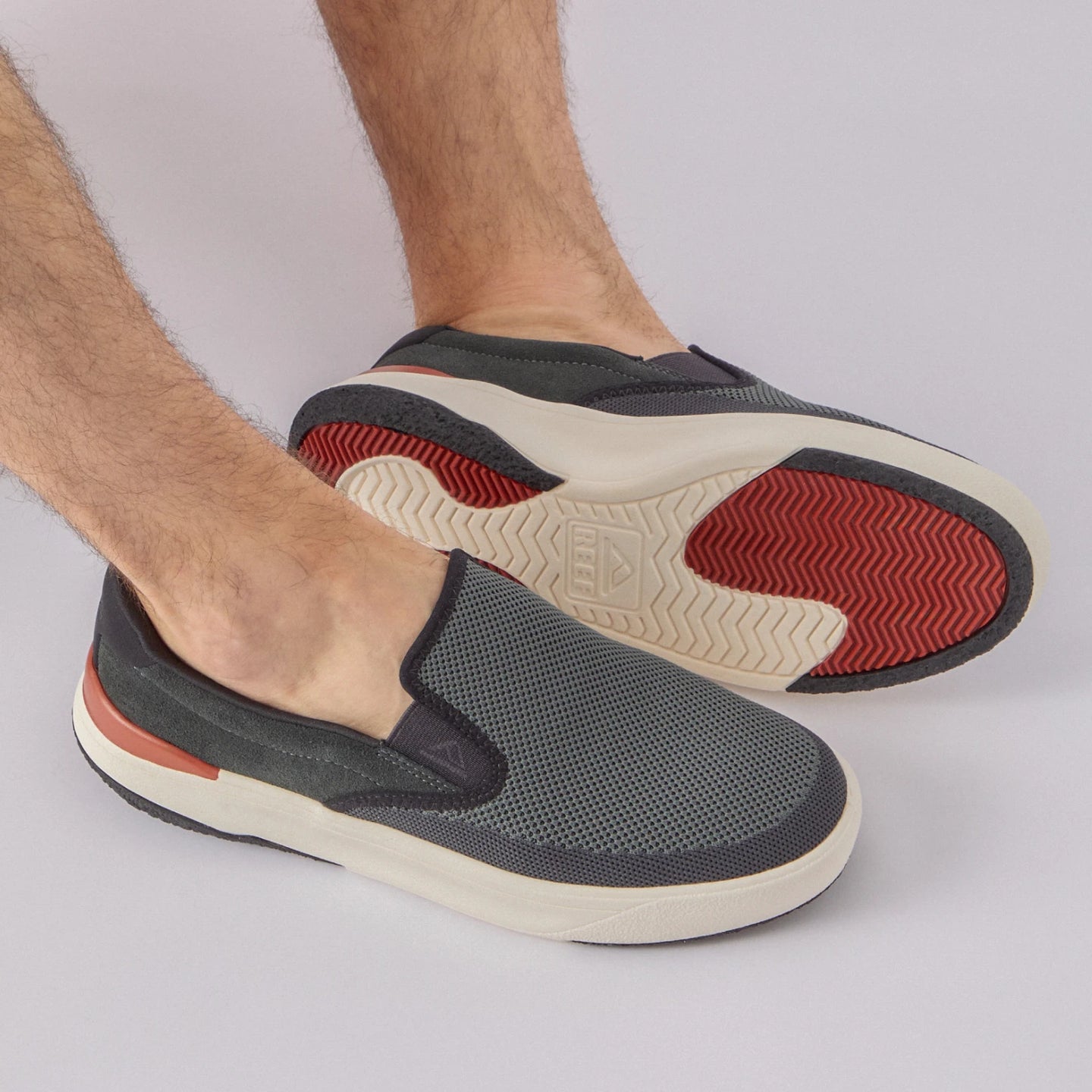 Del Mar Slip On facing right, men's black and grey sneaker with breathable mesh, cushioned sole, and slip-on comfort.