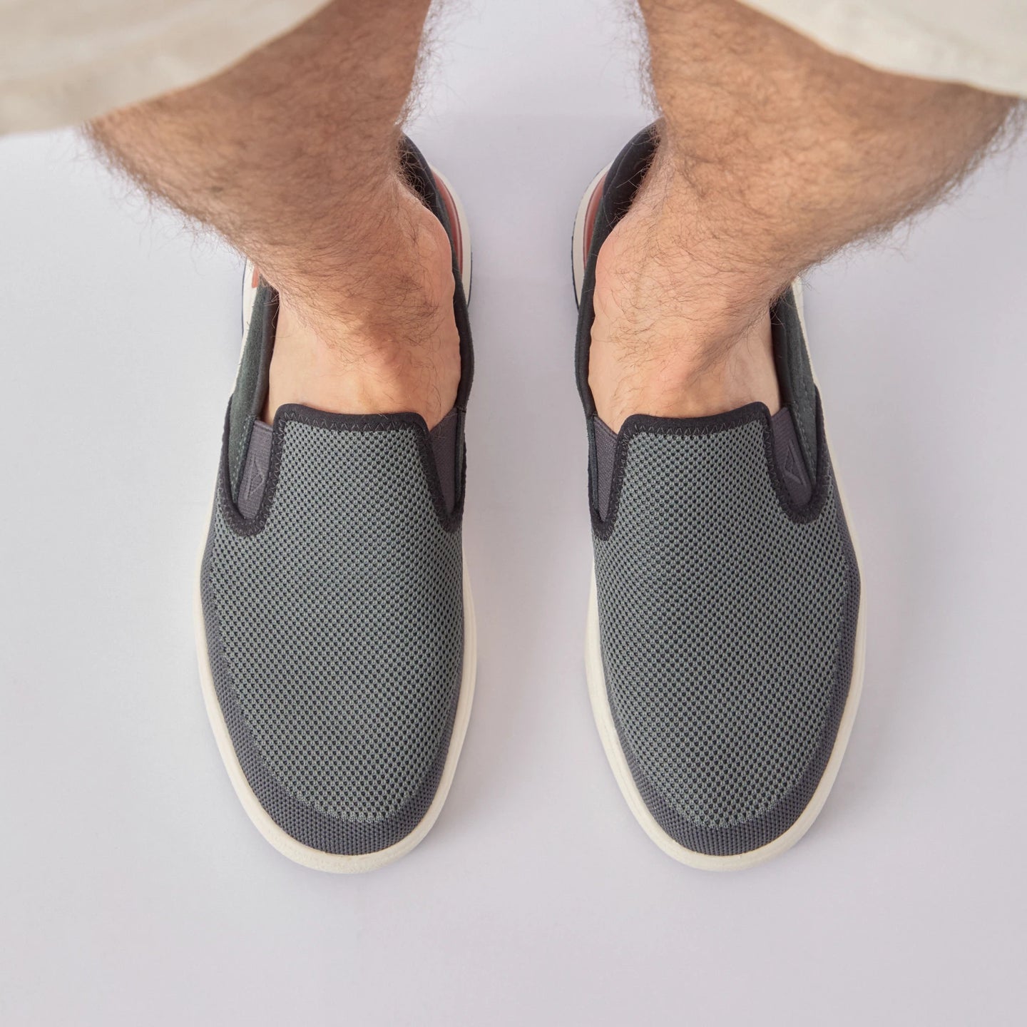 Del Mar Slip On facing forward, men's black and grey slip-on sneaker with lightweight mesh upper and cushioned sole for all-day comfort.