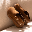 Vista Skye Rosa women's brown leather clog facing left with adjustable backstrap, plush lining, and cushioned sole close-up.