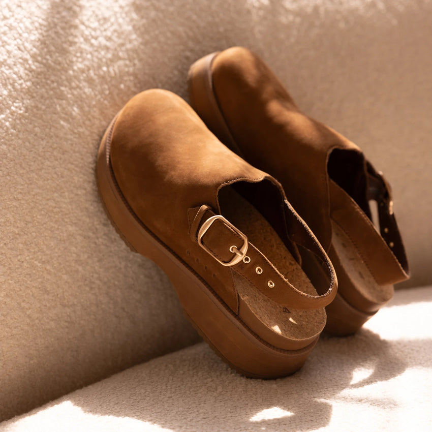 Vista Skye Rosa women's brown leather clog facing left with adjustable backstrap, plush lining, and cushioned sole close-up.